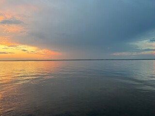 sunset over bay water