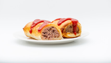 Fresh baked golden flaky beef sausage roll