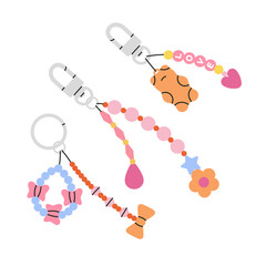 Cute poster with collection of beaded key chains. Beading, handmade, fashion concept. Jewelry for phone or keys.
Hand drawn vector illustration in trendy colors. Isolated on white background.