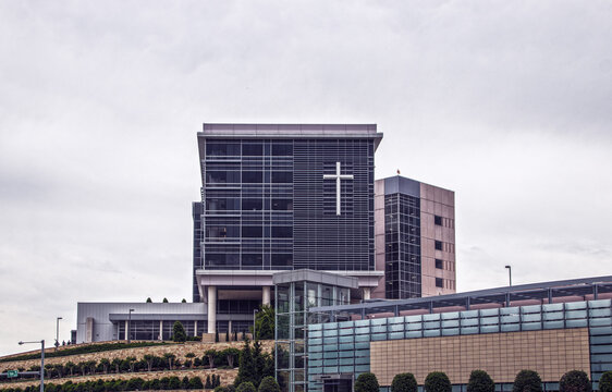 2022_05_13 Tulsa OK USA St Francis Hospital in Tulsa OKlahoma sitting up on a landscaped hill with giant cross on front windows