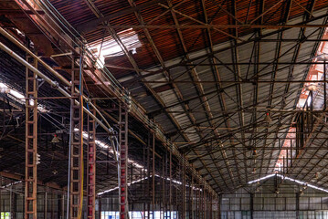 An abandoned steel frame structure automobile production workshop