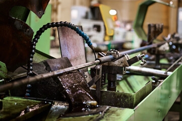 Liquid honing of drill rod with lubricant in workshop