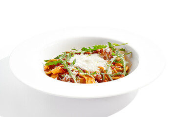Italian pasta pappardelle with bolognese sauce  and parmesan isolated on white background. Pasta...