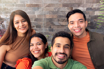 group of young friends taking a selfie