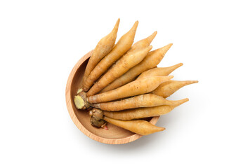 Flat lay of Finger root rhizome in wooden bowl isolated on white background. Clipping path.