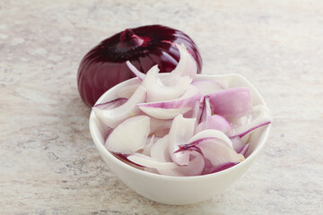 Sliced red onion in the bowl