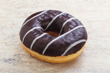 Glazed sweet tasty chocolate donut