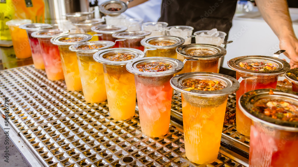 Wall mural preparing fresh brewed ice tea. street food and refreshment