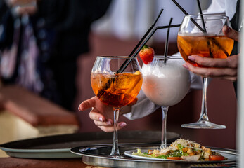 still life with glasses with cocktails on a white table close-up