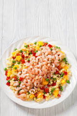 shrimps and millet pilaf with mango and veggies