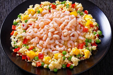 shrimps and millet pilaf with mango and veggies
