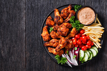 roast chicken wings with french fries and veggies © myviewpoint