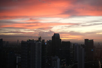 Fototapeta na wymiar Jakarta city viewed from the top and at sunset