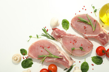 Raw meat and ingredients for cooking on white background
