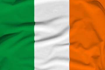 Obraz premium Ireland national flag, folds and hard shadows on the canvas