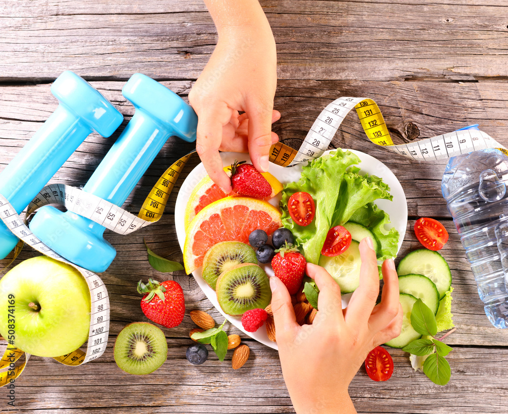 Canvas Prints healthy eating concept with hand holding strawberry