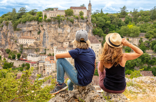 young man and girl enjoying City of Rocamadour- France