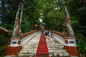 The Mythical Serpent Staircase in Wat Phra That Cho Hae, Phrae province, Thailand. This staircase...