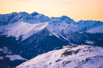 The Crap Sogn Gion Gondola Station in the Flims Laax ski resort in the first light of the day,...