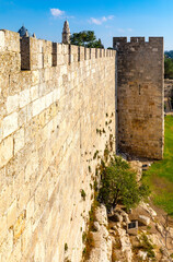 Jerusalem, Israel - October 12, 2017: Walls of Old City over Hativat Yerushalayim street with...