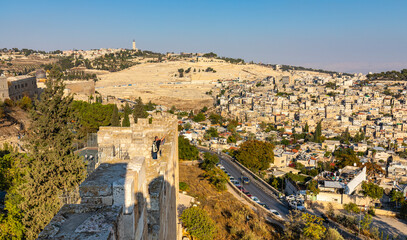 Panorama of Mount of Olives with Siloam village over ancient City of David quarter seen from south...