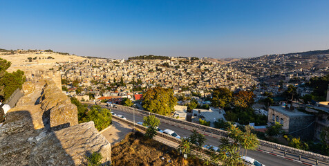 Panorama of Mount of Olives with Siloam village over ancient City of David quarter seen from south wall of Temple Mount in Jerusalem Old City in Israel