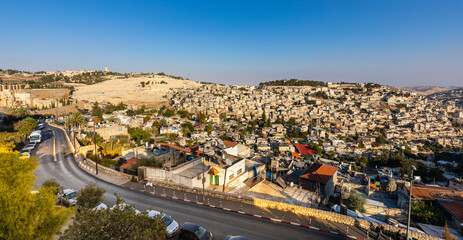 Panorama of Mount of Olives with Siloam village over ancient City of David quarter seen from south wall of Temple Mount in Jerusalem Old City in Israel