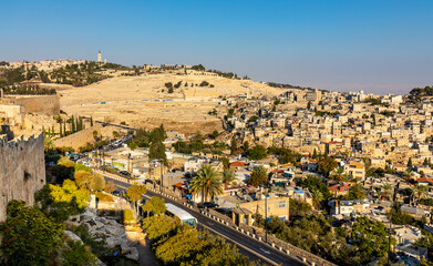 Fototapeta na wymiar Panorama of Mount of Olives with Siloam village over ancient City of David quarter seen from south wall of Temple Mount in Jerusalem Old City in Israel