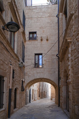 typical street in the old town of Molfetta, Puglia, Italy                        