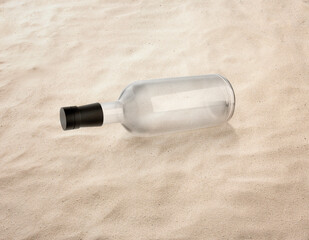Blank Liquor bottle. on the sand, beach, sea