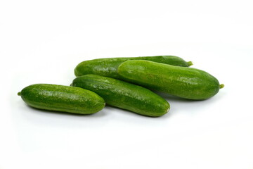 Fresh green cucumber isolated on white