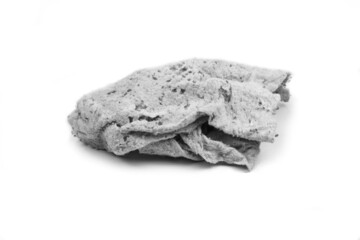 Old dirty torn rag isolated on white background. Cleaning rag.