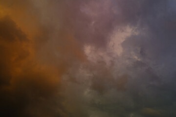 picturesque, blurred stormy sky with dark clouds, approaching thunderstorm. Concept on theme of...