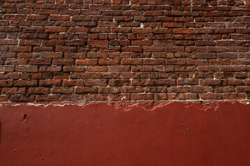 mur de briques rouges pouvant servir de texture grunge ou d'arrière plan