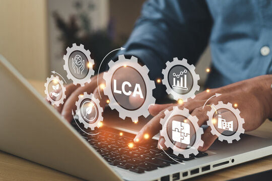 LCA, Life Cycle Assessment Concept. Busines Using A Computer To ISO LCA Standard Aims To Limit Climate Change. Methodology For Assessing Environmental Impacts Associated On Value Chain Product.