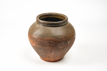 Vintage pottery, vase isolated on white background. Antique brown clay pot on white background.