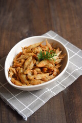 a plate of fried crispy fish on the table 