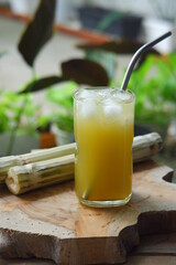 a glass of iced sugar cane drink