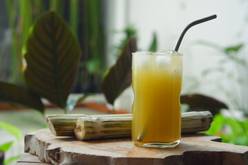 a glass of iced sugar cane drink