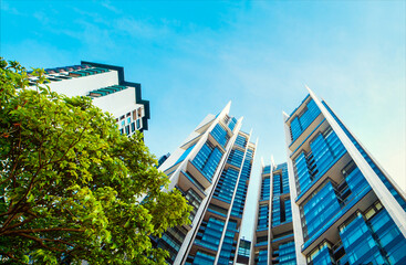 Obraz na płótnie Canvas Modern office Buildings, architecture with blue sky. 3D Rendering