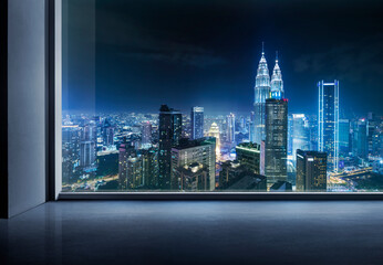 Modern empty and clean office interior with glass window, Kuala Lumpur city skyline background, night scene.