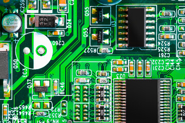 Close up of components and microchips on PC circuit board.