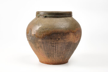 Vintage pottery, vase isolated on white background. Antique brown clay pot on white background.