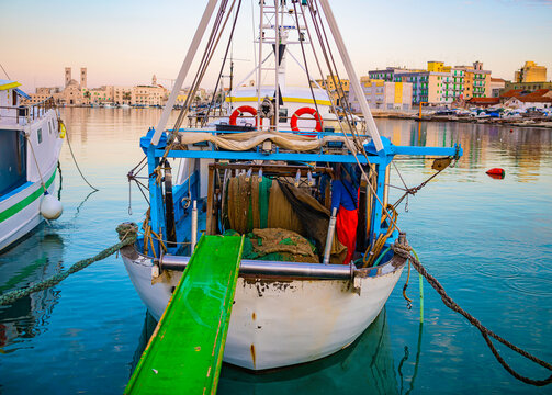 Fishing boat moored in the port of Molfetta, near Bari. Apulia - Italy