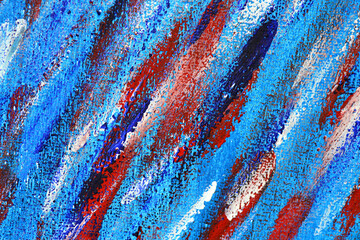 Creative background of colorful brush strokes on canvas close up. Abstract art background from smeared brush strokes of blue, red, white colors macro. Drawing, painting paints texture surface backdrop