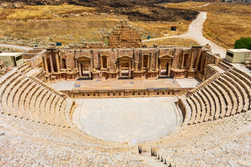 Jerash, Jordan - June 5 2019: The perfectly preserved south theater of Jerash