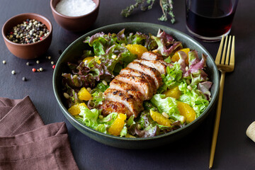 Salad with duck, oranges and nuts. Healthy eating. Diet.