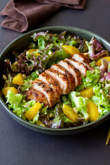 Salad with duck, oranges and nuts. Healthy eating. Diet.