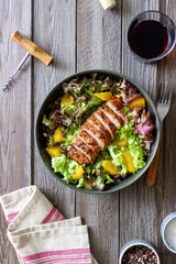 Salad with duck, oranges and nuts. Healthy eating. Diet.