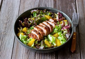 Salad with duck, oranges and nuts. Healthy eating. Diet.